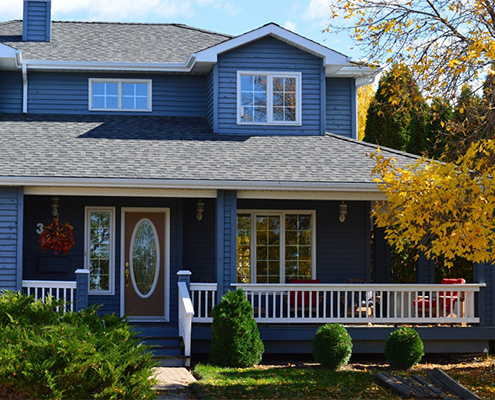 A beautiful suburban American home with a front porch